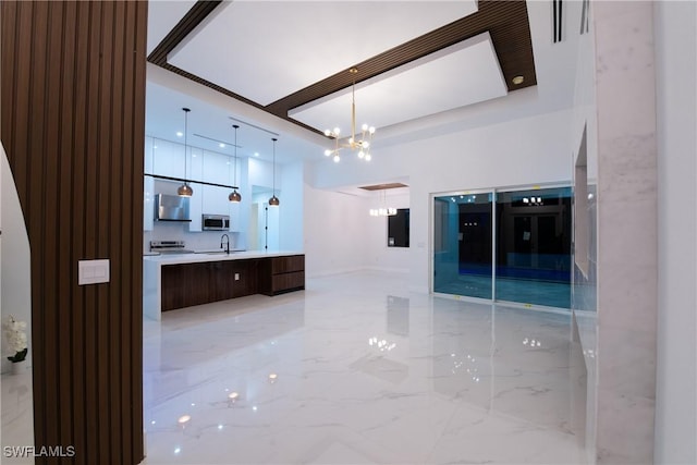 bathroom featuring an inviting chandelier and vanity