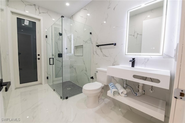 bathroom with an enclosed shower, sink, tile walls, and toilet