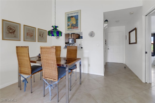 dining room with light tile patterned floors