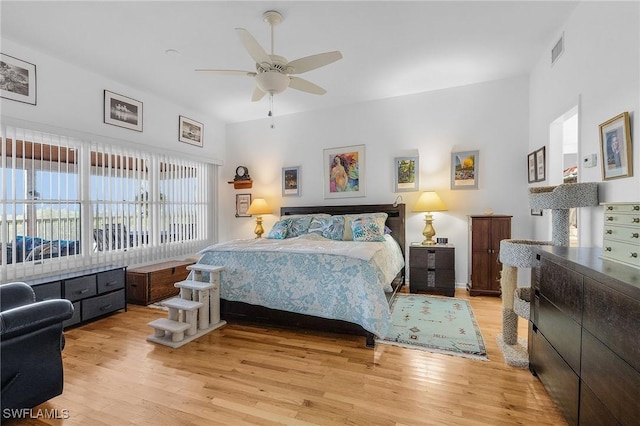 bedroom featuring ceiling fan and light wood-type flooring