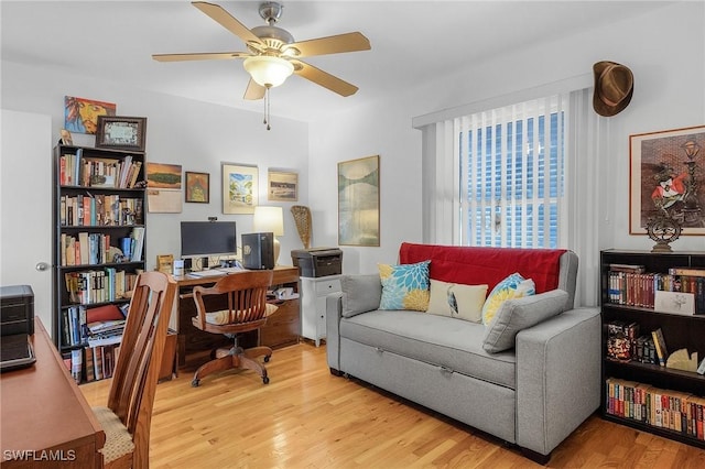 office space featuring wood-type flooring and ceiling fan