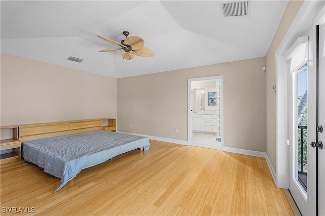 1538 Wilton Ln, Sanibel, FL 33957 - bedroom featuring baseboards, visible vents, light wood-style floors, and vaulted ceiling