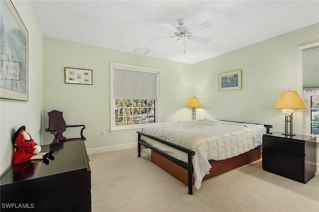 1538 Wilton Ln, Sanibel, FL 33957 - carpeted bedroom with baseboards, visible vents, and ceiling fan