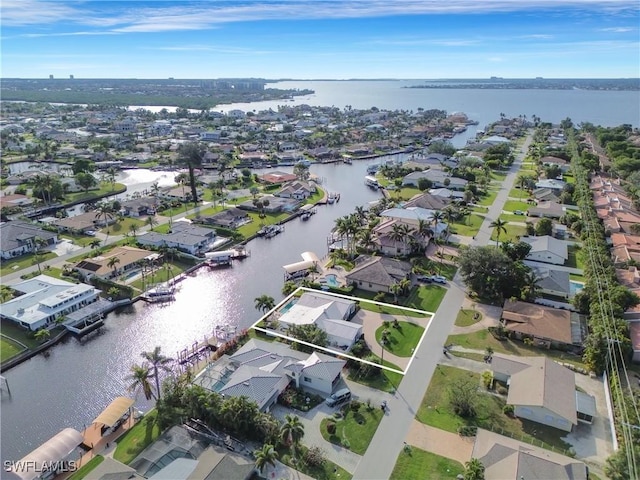 aerial view featuring a water view