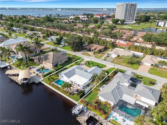 bird's eye view with a water view