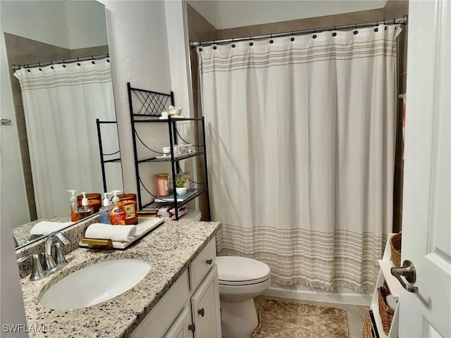 full bathroom with vanity, tile patterned flooring, shower / bath combo, and toilet