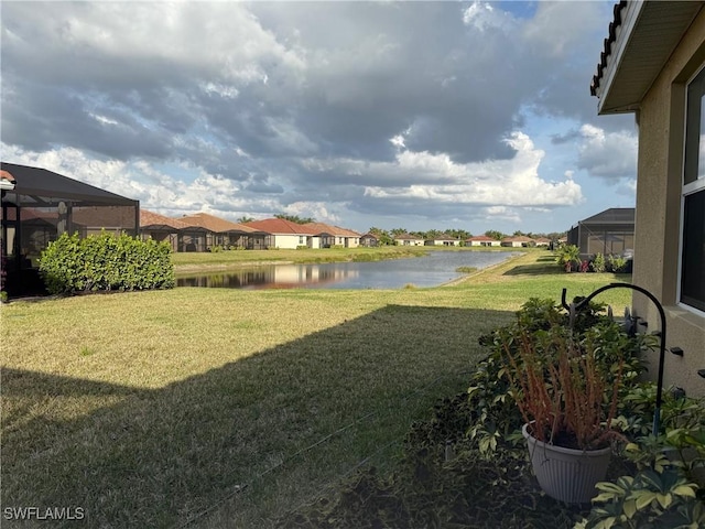 view of yard with a water view