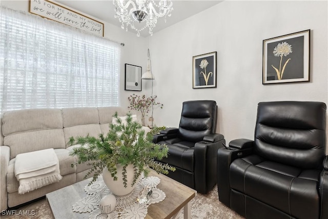 living room featuring a notable chandelier