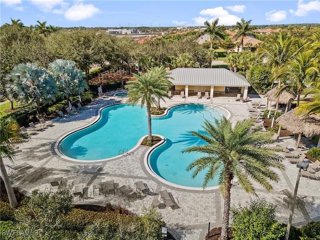 view of swimming pool with a patio area