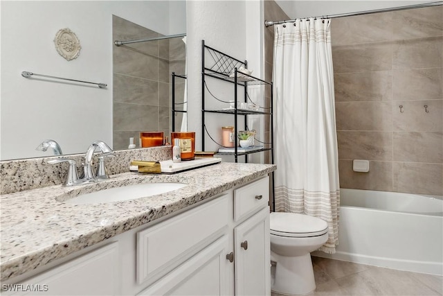 full bathroom featuring shower / tub combo with curtain, vanity, toilet, and tile patterned floors