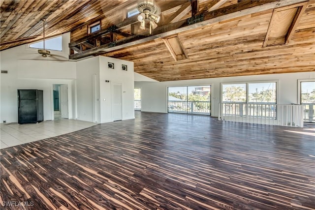 unfurnished living room featuring hardwood / wood-style flooring, wooden ceiling, and ceiling fan