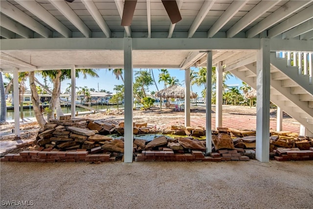 view of patio featuring a water view