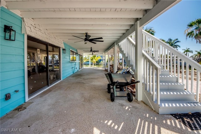 view of patio / terrace featuring ceiling fan