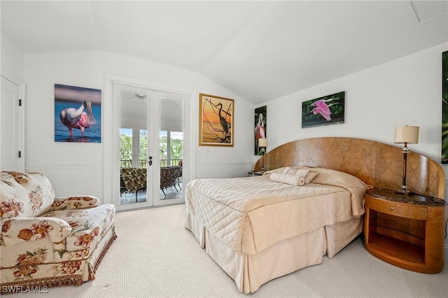 bedroom featuring lofted ceiling, carpet floors, access to exterior, and french doors