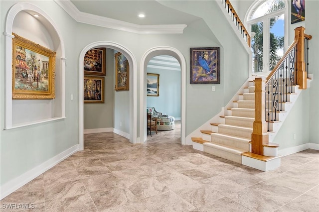 interior space with crown molding