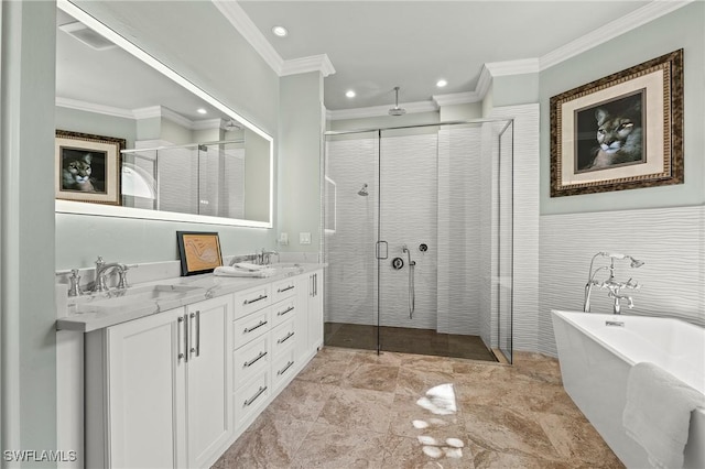 bathroom featuring crown molding, vanity, and independent shower and bath