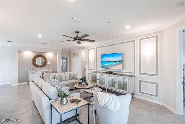 living room with crown molding and ceiling fan