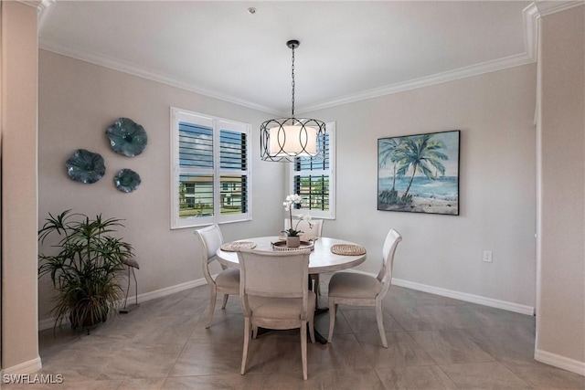 dining area with crown molding and light tile patterned floors