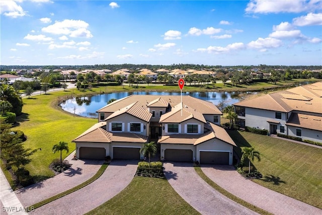 bird's eye view with a water view