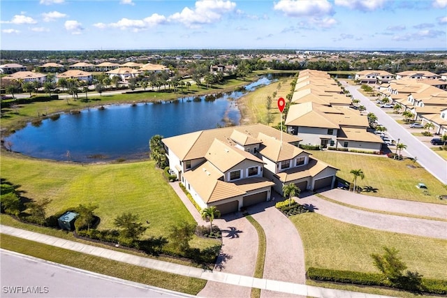 drone / aerial view with a water view