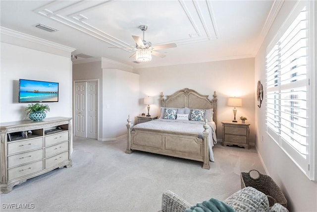 bedroom featuring ceiling fan, ornamental molding, and light carpet