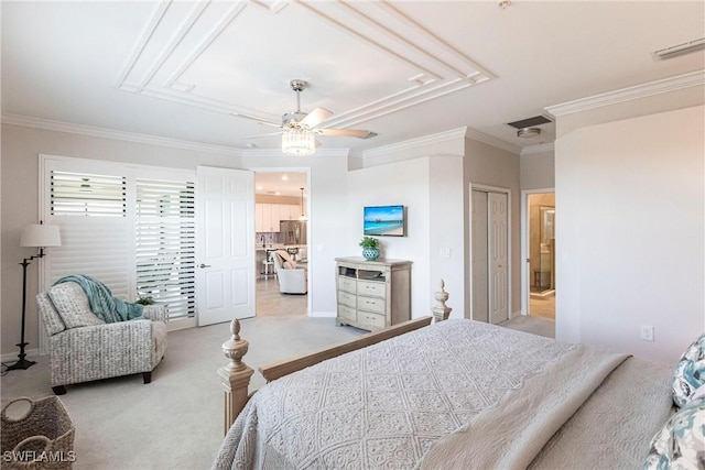 carpeted bedroom with ornamental molding and ceiling fan