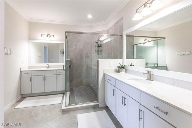 bathroom with vanity, crown molding, and a shower with door