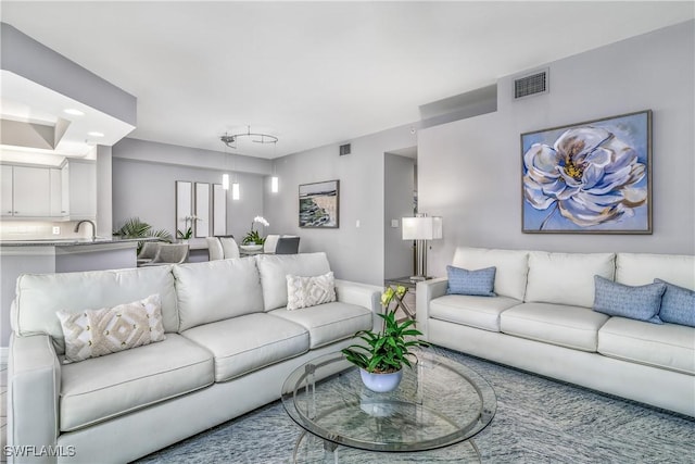 living room with sink