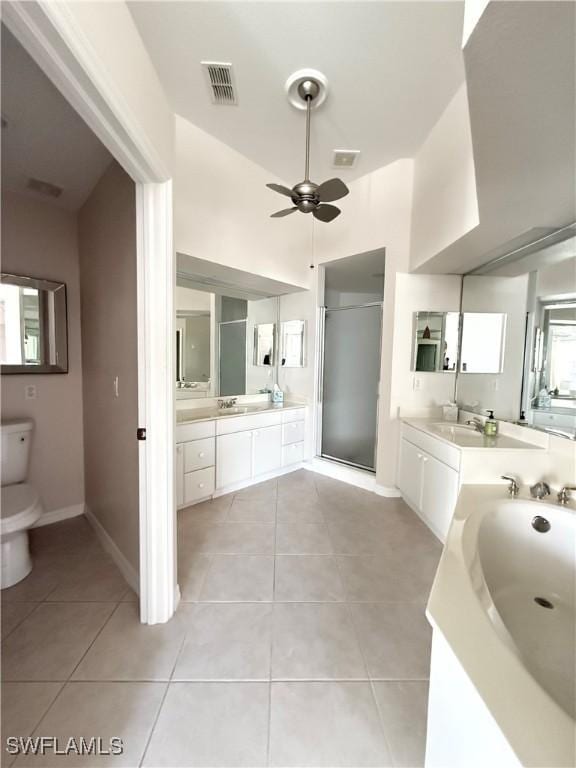 full bathroom featuring ceiling fan, vanity, independent shower and bath, and tile patterned flooring