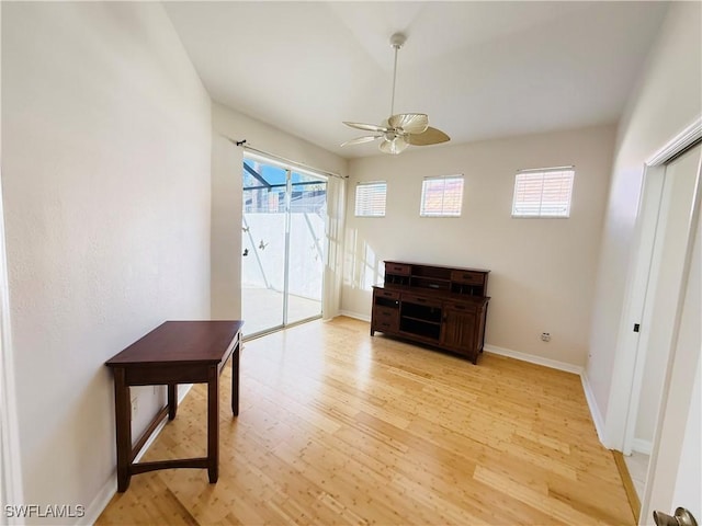 interior space with ceiling fan and light wood-type flooring