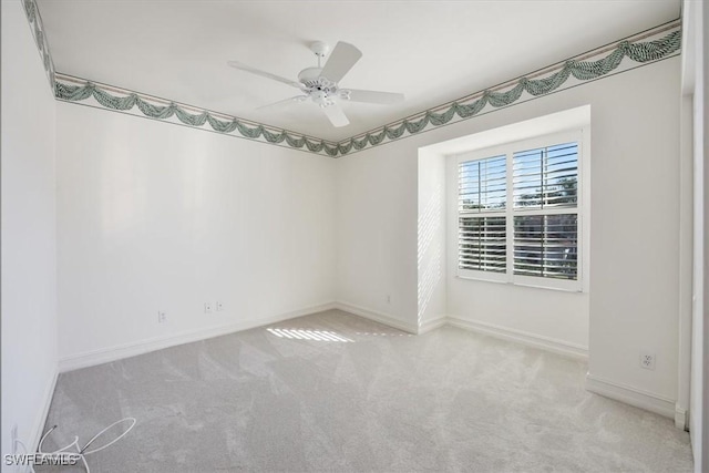1575 Clermont Dr Unit N-201, Naples, FL 34109 - spare room with carpet and ceiling fan
