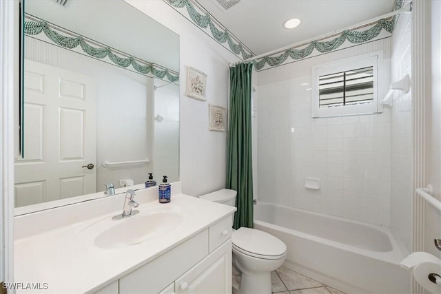1575 Clermont Dr Unit N-201, Naples, FL 34109 - full bathroom with vanity, shower / bath combo with shower curtain, and tile patterned flooring