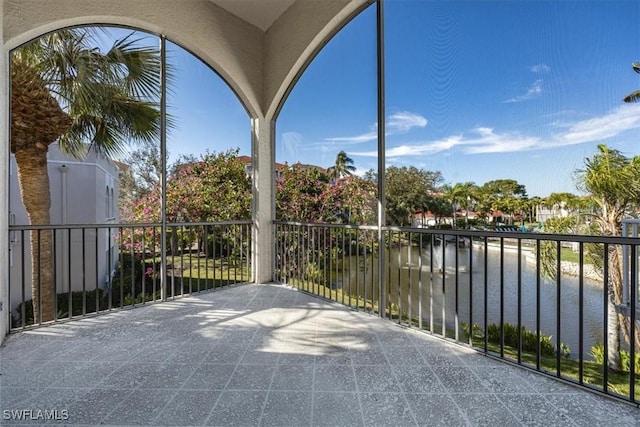 1575 Clermont Dr Unit N-201, Naples, FL 34109 - patio / terrace featuring a water view