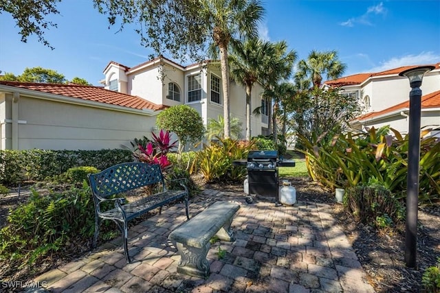 view of patio with a grill