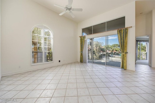 1575 Clermont Dr Unit N-201, Naples, FL 34109 - unfurnished room featuring high vaulted ceiling, ceiling fan, and light tile patterned floors
