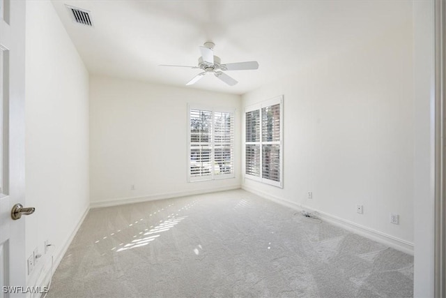 1575 Clermont Dr Unit N-201, Naples, FL 34109 - carpeted spare room featuring a ceiling fan and baseboards
