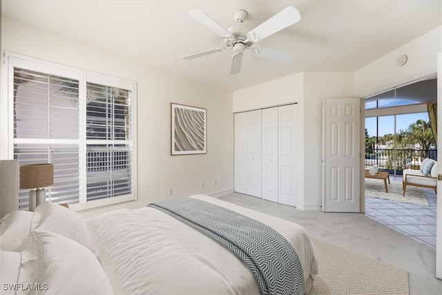 1575 Clermont Dr Unit N-201, Naples, FL 34109 - bedroom with light carpet, a closet, and ceiling fan