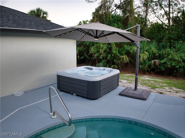 view of pool with a hot tub and central air condition unit