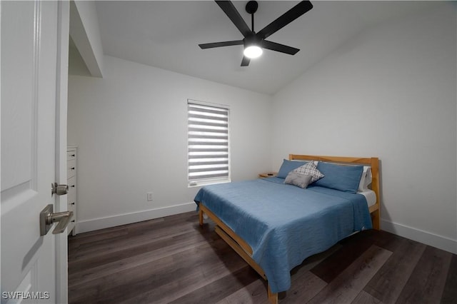 bedroom featuring ceiling fan, lofted ceiling, and dark hardwood / wood-style flooring