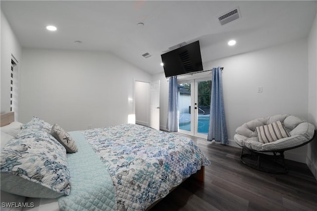 bedroom with lofted ceiling, access to exterior, dark hardwood / wood-style flooring, and french doors