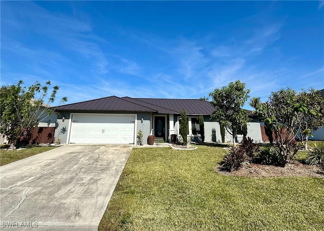 single story home featuring a garage and a front yard