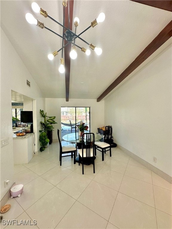 dining area with lofted ceiling with beams and light tile patterned flooring