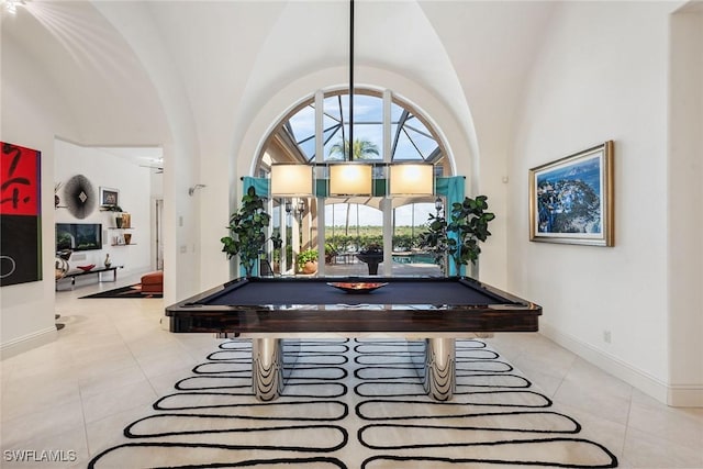 rec room with light tile patterned flooring, billiards, and vaulted ceiling