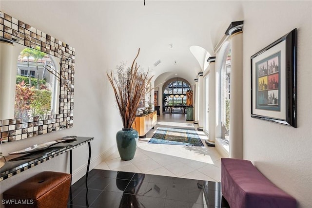 hall with tile patterned flooring