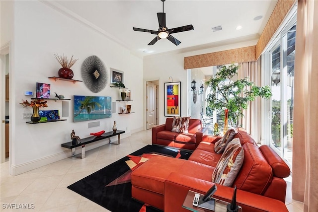 living room featuring light tile patterned flooring and ceiling fan