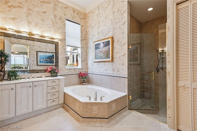 bathroom featuring vanity, separate shower and tub, and tile patterned floors