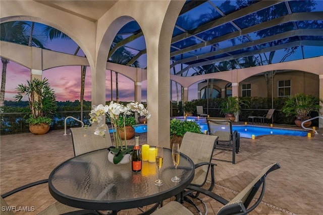 view of patio terrace at dusk