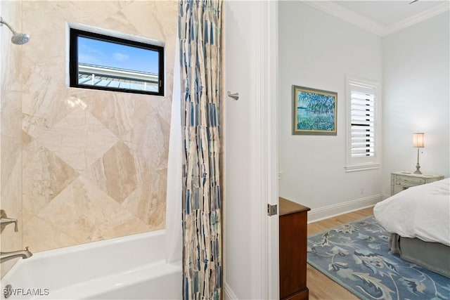 bathroom featuring crown molding, wood-type flooring, and shower / bath combo with shower curtain