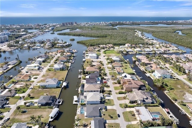 bird's eye view with a water view