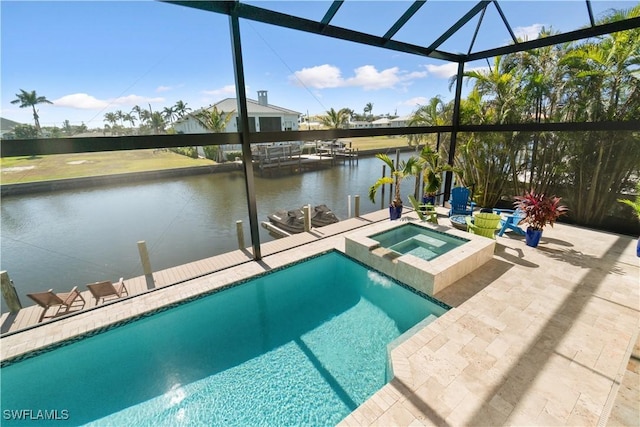 view of pool with an in ground hot tub, a water view, a lanai, and a patio